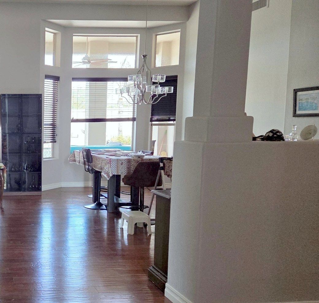 Open great room with polished hardwood floors